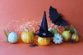 Happy Halloween, jack lantern, illumination, pumpkins, autumn leaves on an orange background Royalty Free Stock Photo