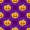 Happy Halloween jackolantern seamless pattern. Jack lantern pumpkin with rays. Vector illustration isolated on purple Royalty Free Stock Photo