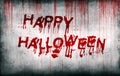 Happy Halloween painted on bloody wall Royalty Free Stock Photo