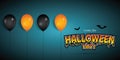 Happy halloween party banner with balloons decoration.