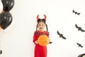 Halloween Party girl devil at home