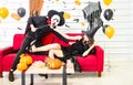 Happy Halloween party concept. Young man and woman wearing as vampires, witch or ghost celebrate the halloween festival