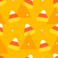 Happy Halloween pattern in polka dot with candy corns and triangles. Royalty Free Stock Photo