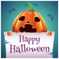 Happy Halloween poster with scared pumpkin with parchment on dark blue background. Happy Halloween party. Royalty Free Stock Photo