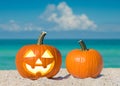 Happy Halloween. Pumpkin Jack-o\'-lantern on the beach. Jack o lantern for Halloween party. Autumn season. Blue ocean Royalty Free Stock Photo