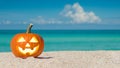 Happy Halloween. Pumpkin Jack-o\'-lantern on the beach. Jack o lantern for Halloween party. Autumn season. Royalty Free Stock Photo