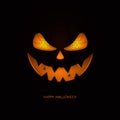 Happy Halloween. Pumpkin mask on a black background. Royalty Free Stock Photo