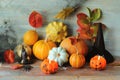 Happy Halloween, pumpkins, Jack lantern with a burning candle, autumn leaves and mystical decorations Royalty Free Stock Photo