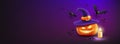 Happy Halloween, pumpkins wearing a purple hat, candel and spider, bat flying, banner design on purple background Royalty Free Stock Photo