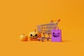 Happy Halloween sale with Jack-o-Lantern pumpkins, shopping cart and shopping bag on orange background Royalty Free Stock Photo