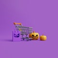 Happy Halloween sale with Jack-o-Lantern pumpkins, shopping cart and shopping bag on purple background Royalty Free Stock Photo