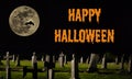 Happy Halloween - spooky graveyard with large moon Royalty Free Stock Photo