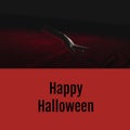 Happy halloween text on red with ghostly severed caucasian hand walking on dark background Royalty Free Stock Photo