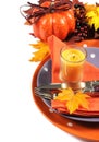 Happy Halloween or Thanksgiving party table place setting with orange and purple theme - vertical. Royalty Free Stock Photo