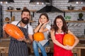 happy halloween. trick or treat. happy parents with kid girl cook pumpkin.