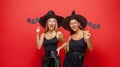 Two young women in black witch costumes Royalty Free Stock Photo