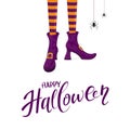 Happy Halloween with witches legs in purple shoes Royalty Free Stock Photo