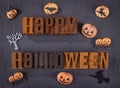 Happy Halloween Wooden Block Text on a Black Background