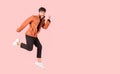 Portrait of young male cheerful confident and excited jump on air and smile in studio. Royalty Free Stock Photo