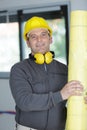 happy handsome builder wearing ear protection Royalty Free Stock Photo