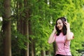 Free careless causual beauty girl woman enjoy relax time in nature spring summer listening to music Royalty Free Stock Photo