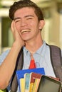 Happy Handsome Filipino Male Student With Books Royalty Free Stock Photo