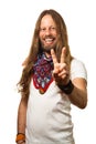 Happy and handsome guy giving a peace sign. Royalty Free Stock Photo