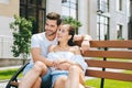 Happy handsome man hugging his girlfriend Royalty Free Stock Photo