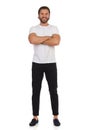 Happy Handsome Man Is Standing With Arms Crossed. Front View Royalty Free Stock Photo