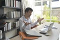 Happy Handsome young businessman working on his desk Royalty Free Stock Photo