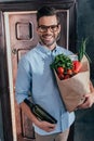 happy handsome young man arrived from Royalty Free Stock Photo