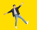 Happy handsome  young man in casual clothes smiling and jumping Royalty Free Stock Photo