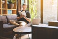 Happy handsome young man reading a book Royalty Free Stock Photo