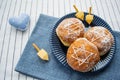 Happy Hanukkah banner. A traditional treat of doughnuts with David star and dreidel made from cheese and biscuit sticks