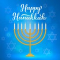 Happy Hanukkah calligraphy hand lettering and gold menorah candles on blue background. Jewish holiday Festival of Lights. Vector Royalty Free Stock Photo