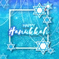 Happy Hanukkah with origami blue Magen David stars. Royalty Free Stock Photo