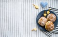 Happy Hanukkah. A traditional treat of doughnuts with David star and dreidel made from cheese and biscuit sticks. Blue fabric