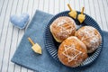 Happy Hanukkah. A traditional treat of doughnuts with David star and dreidel made from cheese and biscuit sticks. Copy space