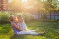 Happy harmonious family outdoors. mother laughing and playing with baby daughter girl in the summer on the nature Royalty Free Stock Photo