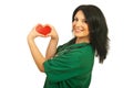 Happy health worker with heart shape