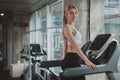 Beautiful young fitness woman working out at the gym Royalty Free Stock Photo