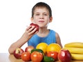 Happy healthy boy eating apple isolated Royalty Free Stock Photo