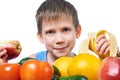 Happy healthy boy eating banana and apple isolated Royalty Free Stock Photo