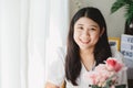 Happy healthy portrait Asian teen girl smiling at home with copy space Royalty Free Stock Photo