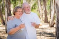 Happy Healthy Senior Couple Drinking Water Bottles Outdoors Royalty Free Stock Photo