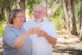 Happy Healthy Senior Couple with Water Bottles Royalty Free Stock Photo