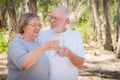 Happy Healthy Senior Couple with Water Bottles Royalty Free Stock Photo