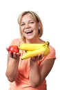 Happy and healthy woman with banana and apple