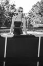 Happy healthy woman in swimming pool in sunglasses Royalty Free Stock Photo