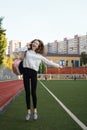 Happy high school girl talking on phone Royalty Free Stock Photo